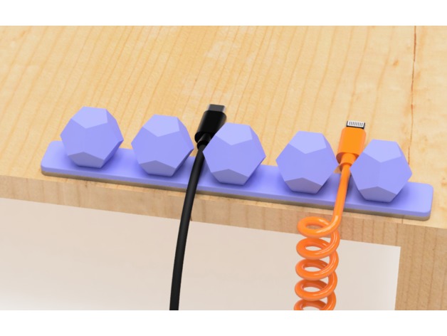 Dekorativni držač kablića na stolu