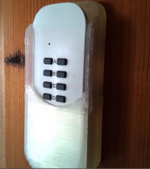 Zidni držač za daljinski upravljač