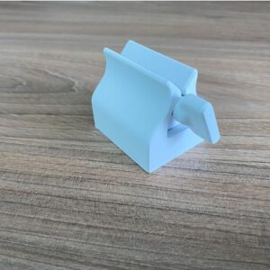 Alternative view of Istiskivač i držač paste za zube