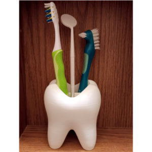 Držač četkice i paste za zube u obliku zuba