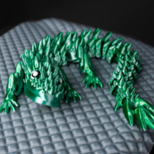 Igračka šiljasti planinski zmaj koji se savija